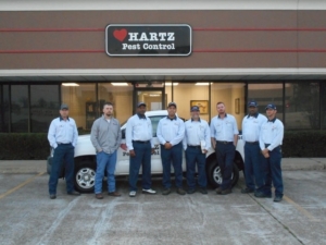 Hartz Pest Control Sugarland Exterminators pose for picture